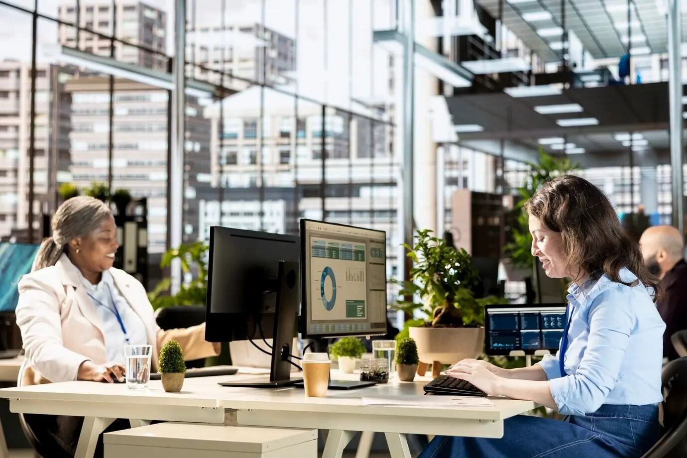 A female manager working on budget analysis and strategy development.