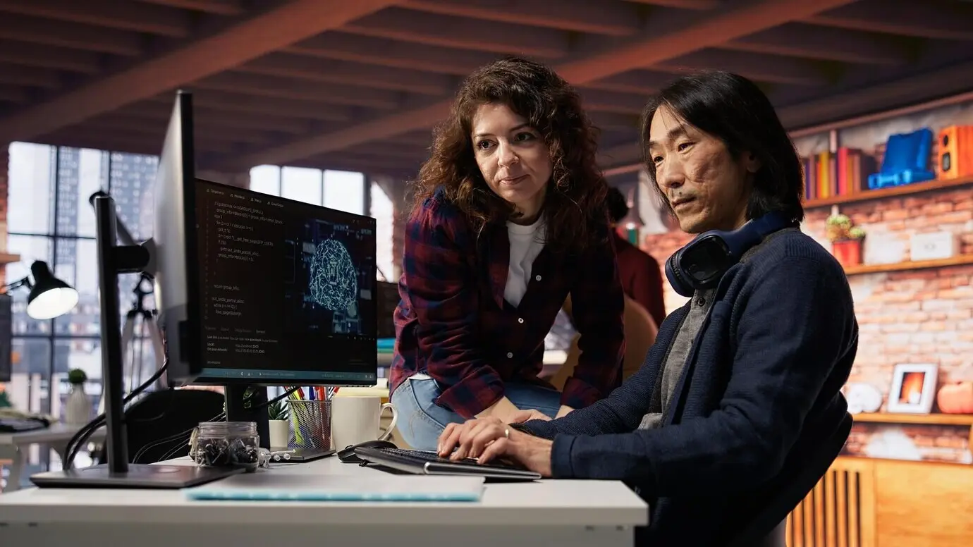 An employee at an artificial intelligence tech venture requests help from a manager.